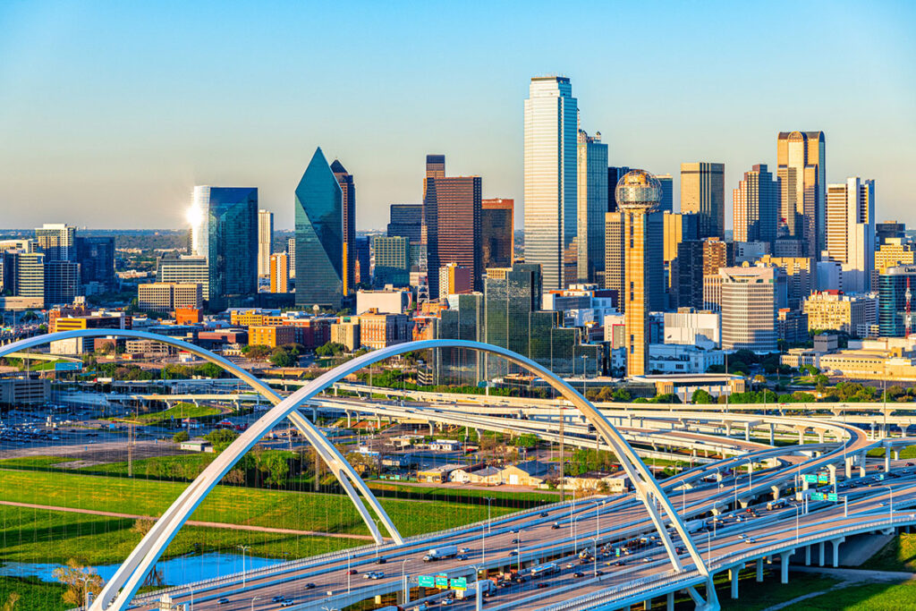 Aerial view of downtown Dallas skyline at dusk