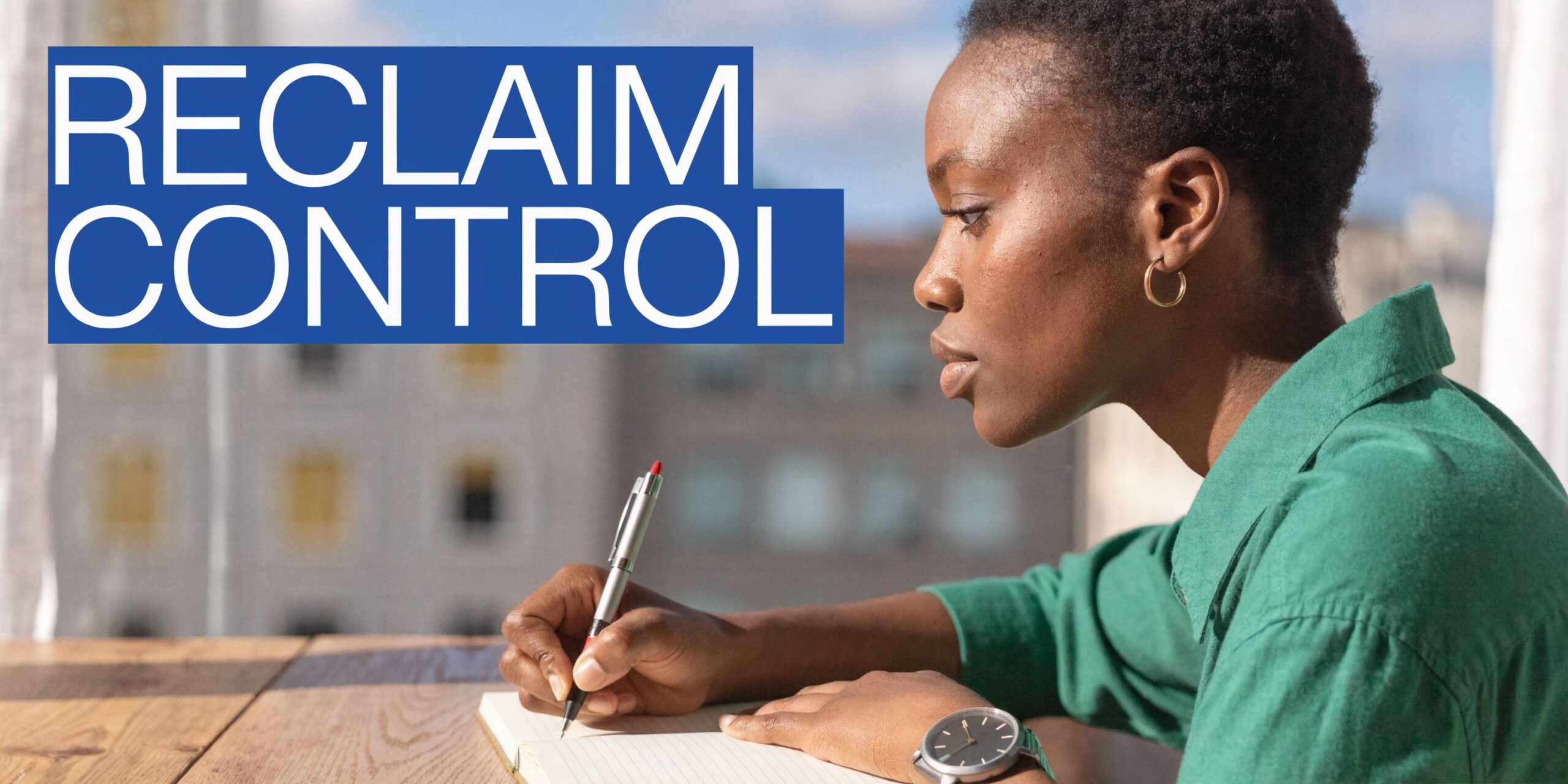 A woman writing in a journal as part of cognitive behavioral therapy for her alcohol addiction recovery journey.