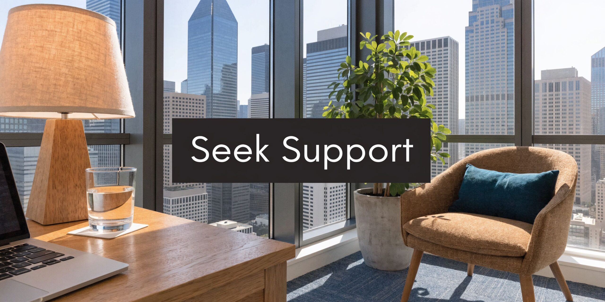 A modern, sunlit home office overlooking a city skyline with a comfortable chair, lamp, and workspace.