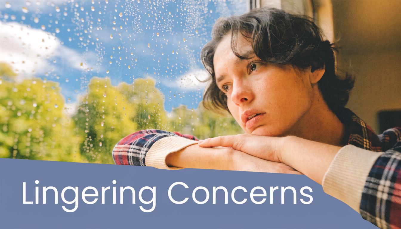 A pensive young person looking through a rain-streaked window, representing lingering mental health concerns and emotional reflection.