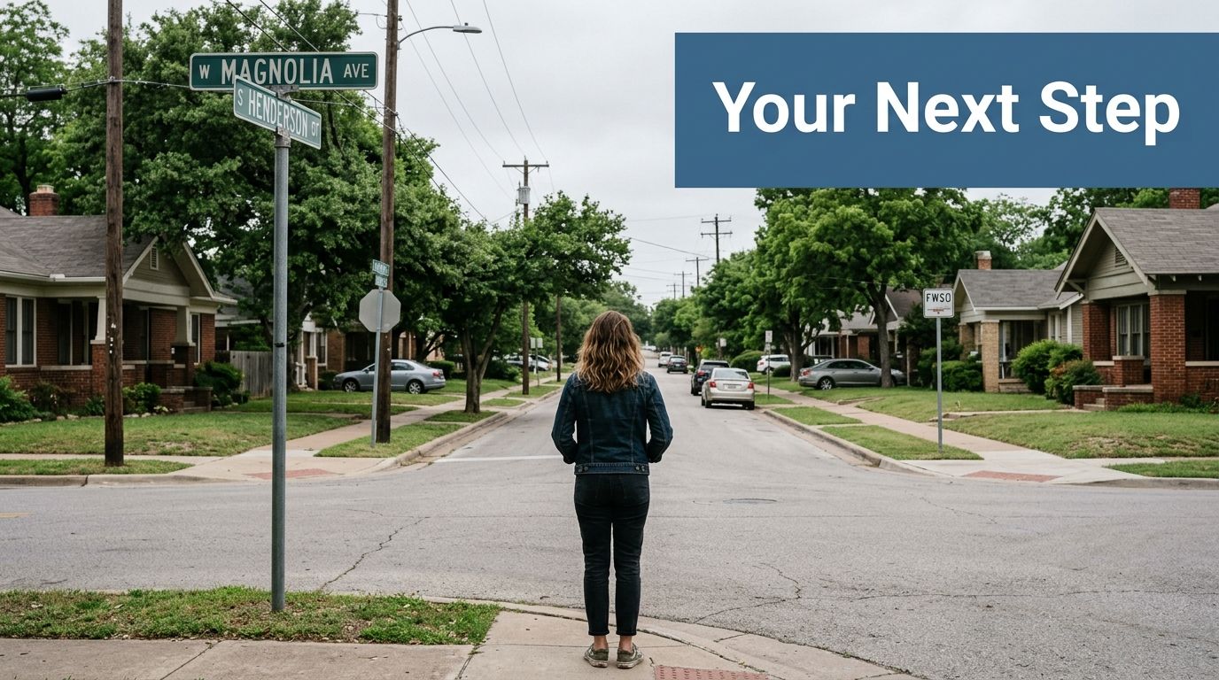 A person standing at a street intersection in Fort Worth, looking toward a quiet residential neighborhood.
